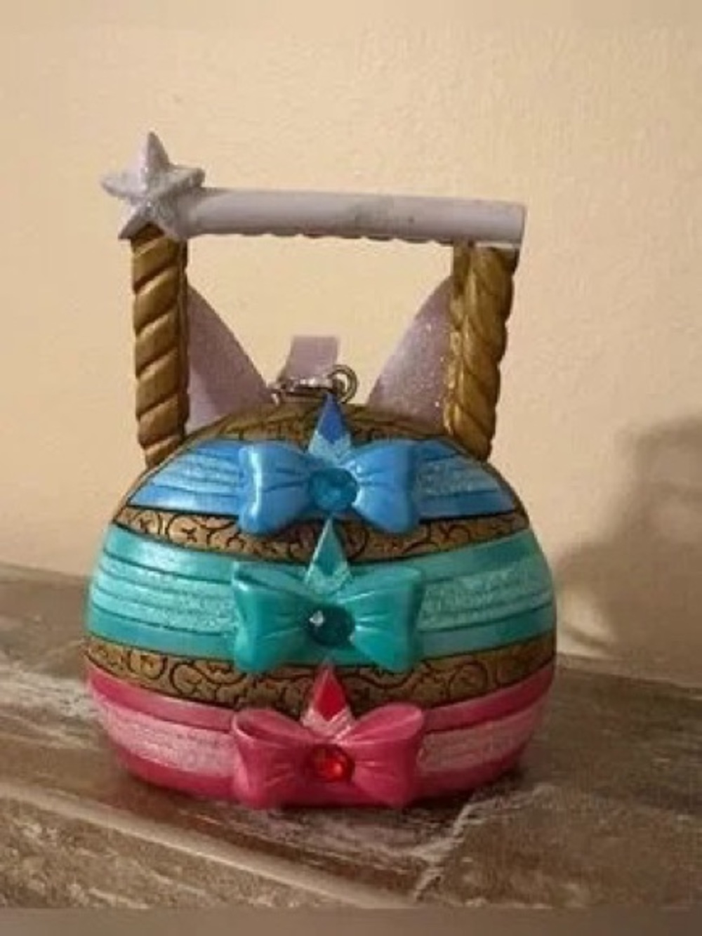 Striped Holiday Ornament with Blue and Pink Bows